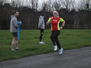 Me running at the Christmas Eve parkrun